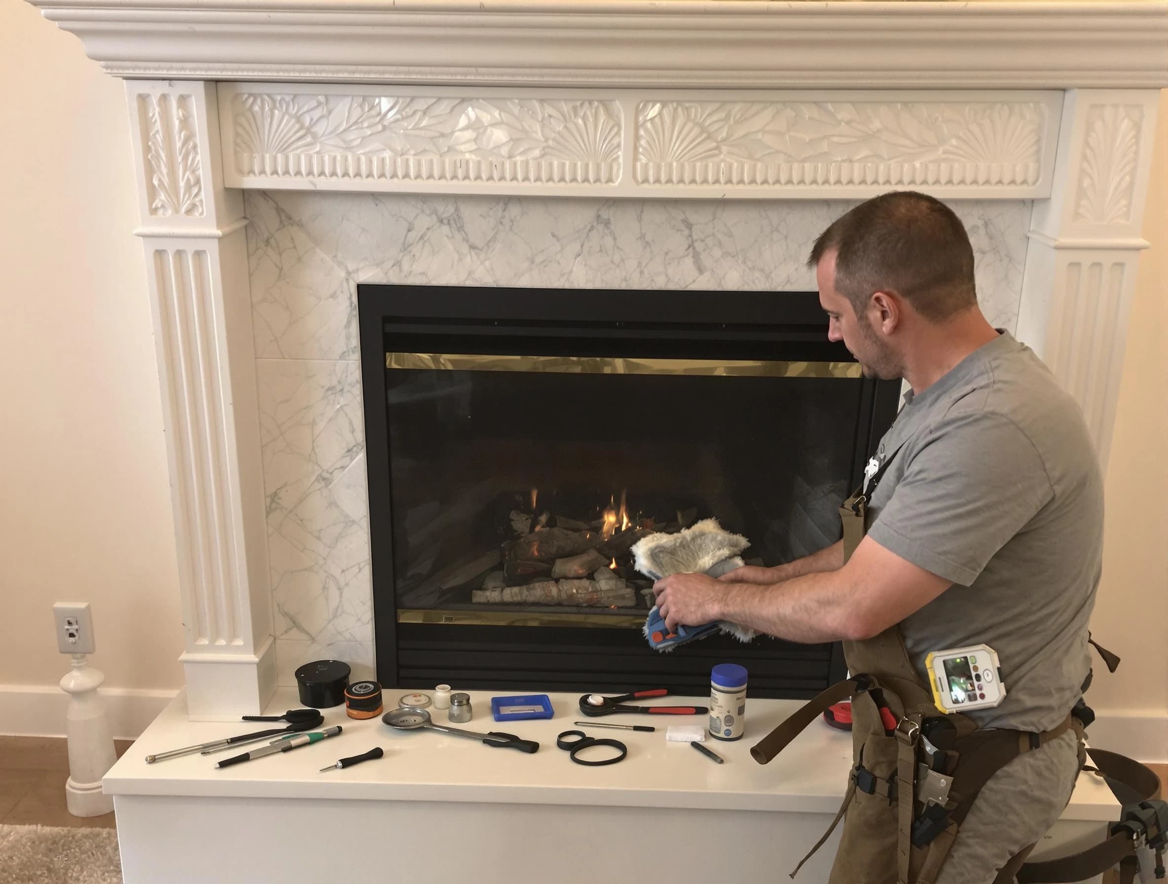 Tucker Chimney Sweep performing fireplace maintenance in Tucker, GA